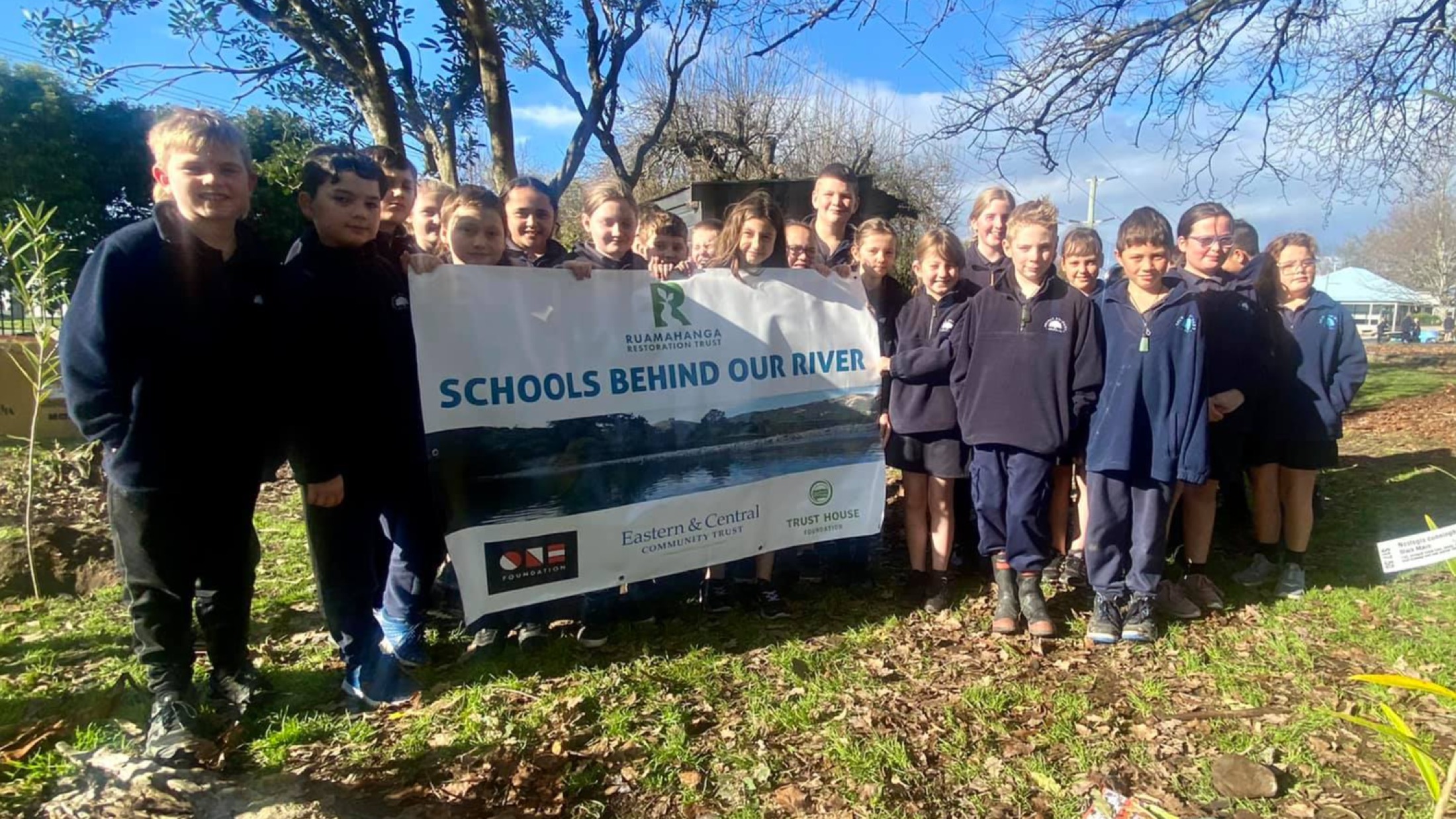 Solway Primary students with banner